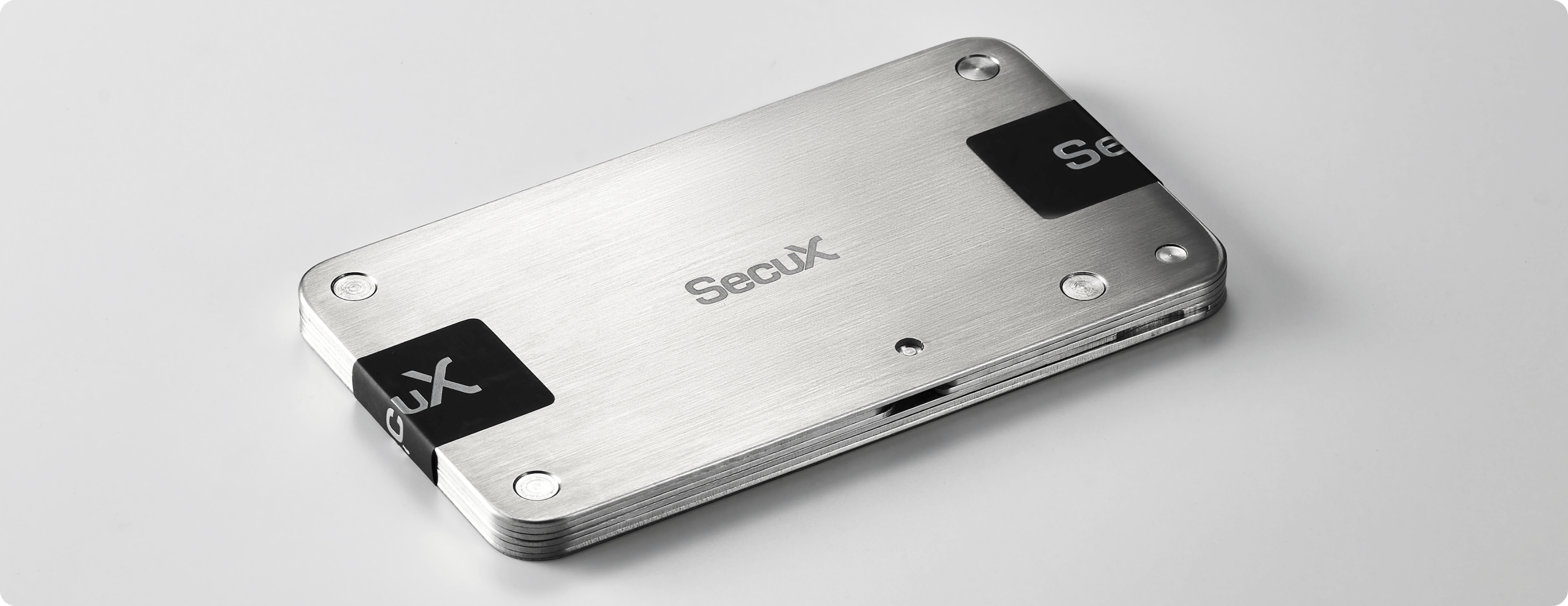 Seal SecuX crypto seed storage system with SecuX tamper-proof stickers to prevent third-party access to your private key